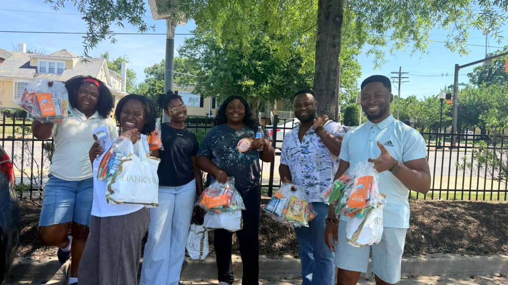 Outreach team with care packages for the neighbourhood