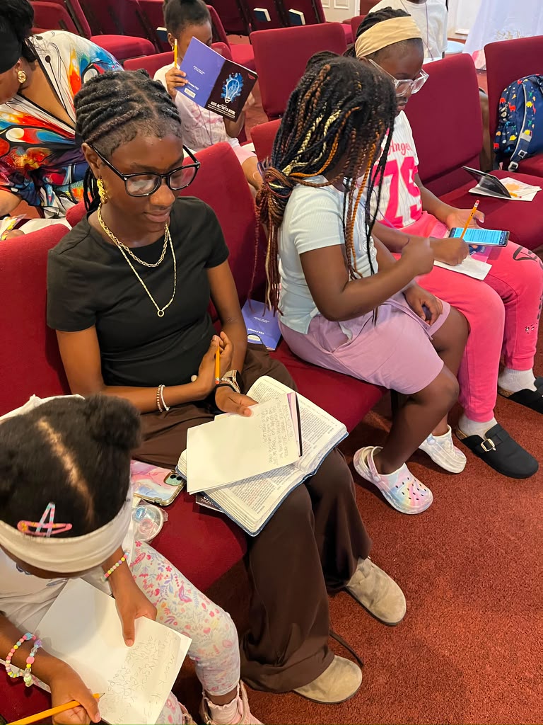 Children studying the Bible together at Vacation Bible School